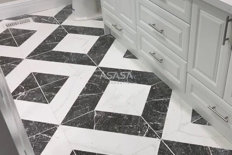 LAYING NEW FLOOR TILES