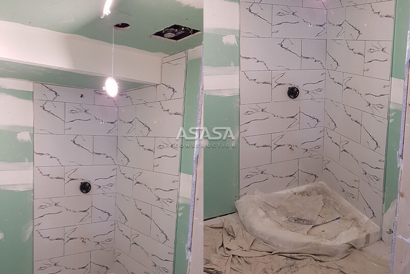 INSTALLATION OF TILES ON THE FLOOR AND SHOWER WALL